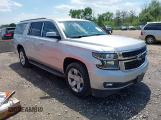 2015 Chevrolet Suburban LT with VIN 1GNSKJKC3FR694341, listed as a IAAI auction lot 42535794 with 139,758 mi miles and . Bid and sale history available at DreamBid. Image 1.
