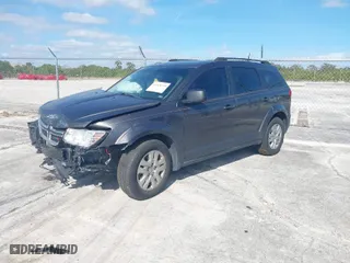 2019 Dodge Journey SE Value Pkg with VIN 3C4PDCAB7KT747315, listed as a IAAI auction lot 41028740 with 143,469 mi miles. Bid and sale history available at carsss.com. Image 2.