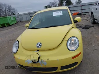 2009 Volkswagen New Beetle Coupe S with VIN 3VWPW31C59M518880, listed as a IAAI auction lot 41201971 with 99,976 mi miles. Bid and sale history available at carsss.com. Image 12.