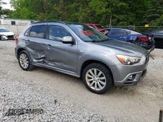 2011 Mitsubishi Outlander SE z VIN JA4AP4AU7BZ013457, wystawiony jako Copart lot #58860505 z przebiegiem 221 993 mil mil oraz Szkoda całkowita • Salvage title. Historia ofert i sprzedaży dostępna na DreamBid. Obrazek 4.