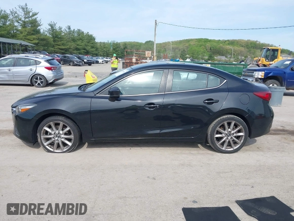 2017 Mazda 3 Touring z VIN 3MZBN1V74HM133565, wystawiony jako IAAI lot #42160836 z przebiegiem 104 997 mil mil oraz . Historia ofert i sprzedaży dostępna na DreamBid. Obrazek 14.