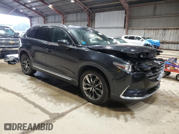 2016 Mazda CX-9 Grand Touring with VIN JM3TCADY2G0104050, listed as a Copart auction lot 56581425 with 100,737 mi miles and Salvage title. Bid and sale history available at DreamBid. Image 4.