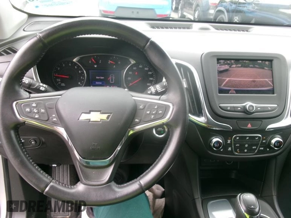 2020 Chevrolet Equinox LT with VIN 2GNAXJEV7L6231166, listed as a IAAI auction lot 42572055 with 24,491 mi miles and . Bid and sale history available at DreamBid. Image 13.