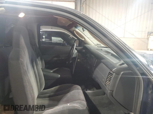 2004 Dodge Dakota z VIN 1D7GG16KX4S586053, wystawiony jako Copart lot #60221585 z przebiegiem 150 150 mil mil oraz Szkoda całkowita • Salvage title. Historia ofert i sprzedaży dostępna na DreamBid. Obrazek 10.