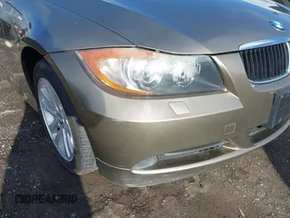 2007 BMW 3 Series 328xi with VIN WBAVC93577KX57207, listed as a IAAI auction lot 42024089 with 119,521 mi miles. Bid and sale history available at carsss.com. Image 6.