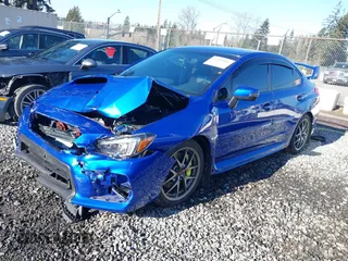 2021 Subaru WRX STI with VIN JF1VA2S6XM9815409, listed as a IAAI auction lot 41413955 with 18,077 mi miles. Bid and sale history available at carsss.com. Image 2.