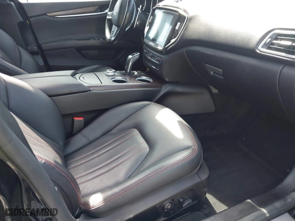 2019 Maserati Ghibli with VIN ZAM57XSA5K1328183, listed as a IAAI auction lot 41970101 with 61,260 mi miles. Bid and sale history available at carsss.com. Image 5.