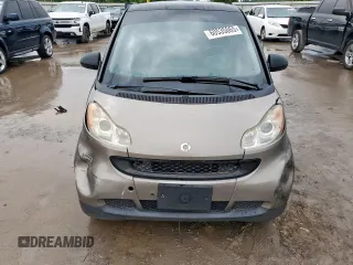 2009 Smart fortwo Pure z VIN WMEEJ31X49K233947, wystawiony jako Copart lot #60535065 z przebiegiem 48 669 mil mil oraz Czysty tytuł • Clean title. Historia ofert i sprzedaży dostępna na DreamBid. Obrazek 5.
