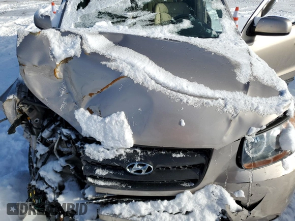 2007 Hyundai Santa Fe GL z VIN 5NMSG13E67H124723, wystawiony jako Copart lot #85953554 z przebiegiem 103 837 mil mil oraz Szkoda całkowita • Salvage title. Historia ofert i sprzedaży dostępna na DreamBid. Obrazek 12.