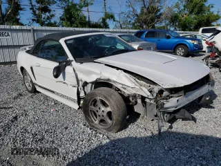 2002 Ford Mustang Deluxe with VIN 1FAFP44492F121223, listed as a Copart auction lot 62474065 with 128,984 mi miles and Salvage title. Bid and sale history available at DreamBid. Image 4.