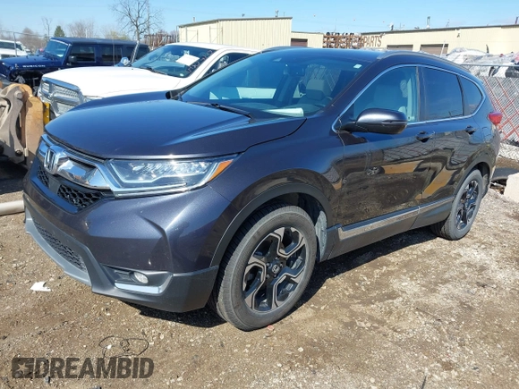 2018 Honda CR-V Touring with VIN 7FARW2H94JE044336, listed as a IAAI auction lot 41934128 with 70,861 mi miles. Bid and sale history available at carsss.com. Image 17.