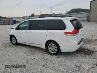 2012 Toyota Sienna XLE AAS с VIN 5TDYK3DC7CS207716, выставлен на аукционе Copart как лот 60592265 с пробегом 287 021 миль миль и Списание • Salvage title. История ставок и продаж доступна на DreamBid. Изображение 2.