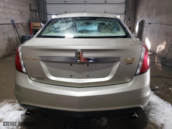 2010 Lincoln MKS with VIN 1LNHL9ER9AG604804, listed as a Copart auction lot 44301745 with 137,840 mi miles and Salvage Title. Bid and sale history available at carsss.com. Image 6.