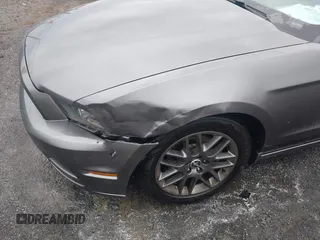 2014 Ford Mustang V6 with VIN 1ZVBP8EM1E5228353, listed as a IAAI auction lot 41525666 with 138,024 mi miles. Bid and sale history available at carsss.com. Image 18.