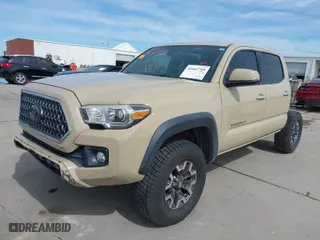 2018 Toyota Tacoma SR with VIN 3TMCZ5AN6JM153006, listed as a IAAI auction lot 41662705 with 176,659 mi miles. Bid and sale history available at carsss.com. Image 2.