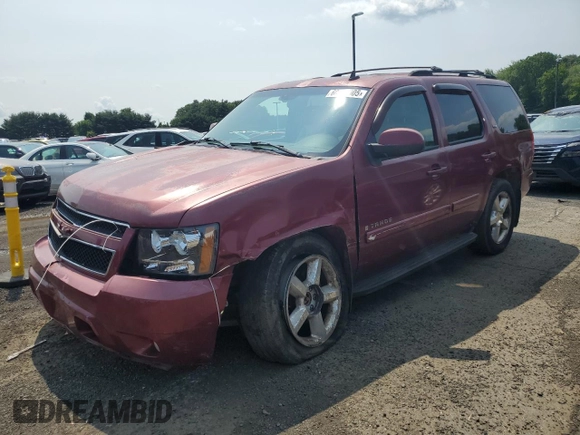 2007 Chevrolet Tahoe LTZ with VIN 1GNFK13007J153690, listed as a Copart auction lot 60614905 with 221,910 mi miles and Salvage title. Bid and sale history available at DreamBid. Image 1.