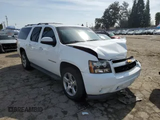 2014 Chevrolet Suburban LT with VIN 1GNSCJE00ER209005, listed as a Copart auction lot 45729745 with 129,662 mi miles and Salvage Title. Bid and sale history available at carsss.com. Image 4.