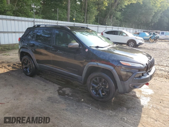2015 Jeep Cherokee Trailhawk z VIN 1C4PJMBS6FW652001, wystawiony jako Copart lot #62344785 z przebiegiem 165 473 mil mil oraz Szkoda całkowita • Salvage title. Historia ofert i sprzedaży dostępna na DreamBid. Obrazek 4.