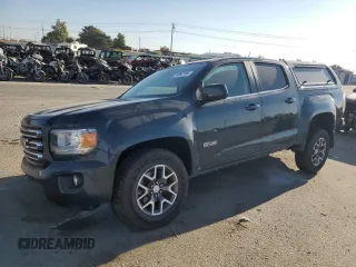2017 GMC Canyon z VIN 1GTP6CE1XH1252005, wystawiony jako Copart lot #74982794 z przebiegiem 62 797 mil mil oraz Szkoda całkowita • Salvage title. Historia ofert i sprzedaży dostępna na DreamBid. Obrazek 1.