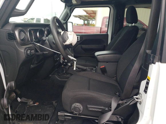 2022 Jeep Wrangler Sport S with VIN 1C4GJXAG2NW173555, listed as a Copart auction lot 87008354 with 28,932 mi miles and Salvage title. Bid and sale history available at DreamBid. Image 7.