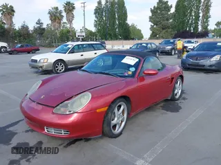 2002 Porsche Boxster z VIN WP0CA29842U621669, wystawiony jako IAAI lot #42218784 z przebiegiem 109 578 mil mil oraz . Historia ofert i sprzedaży dostępna na DreamBid. Obrazek 6.