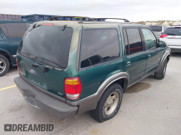 2000 Ford Explorer XLT z VIN 1FMZU63EXYZA22693, wystawiony jako IAAI lot #41350520 z przebiegiem 244 843 mil mil oraz . Historia ofert i sprzedaży dostępna na DreamBid. Obrazek 4.