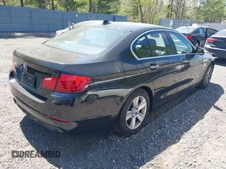 2013 BMW 5 Series 528i xDrive with VIN WBAXH5C50DDW12545, listed as a IAAI auction lot 42139257 with 140,710 mi miles and . Bid and sale history available at carsss.com. Image 4.