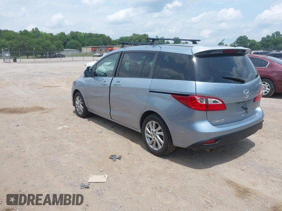 2012 Mazda 5 Sport with VIN JM1CW2BLXC0106748, listed as a IAAI auction lot 42435965 with 153,786 mi miles and . Bid and sale history available at DreamBid. Image 3.