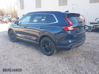 2025 Honda CR-V Hybrid Sport-L with VIN 5J6RS6H89SL002517, listed as a IAAI auction lot 40805874 with 5,218 mi miles. Bid and sale history available at carsss.com. Image 3.