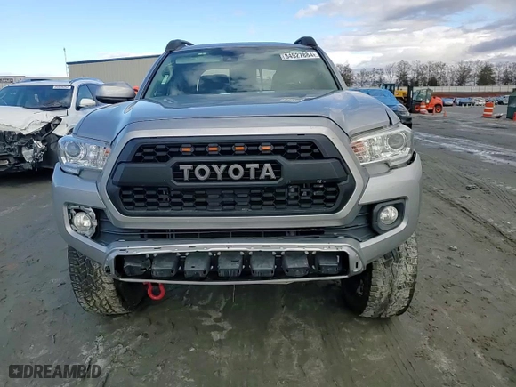 2019 Toyota Tacoma 2WD SR with VIN 5TFAX5GN2KX142522, listed as a Copart auction lot 84527884 with 73,671 mi miles and Salvage Title. Bid and sale history available at carsss.com. Image 11.