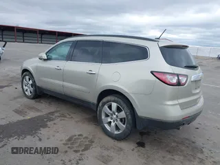 2015 Chevrolet Traverse LTZ z VIN 1GNKRJKD6FJ237851, wystawiony jako IAAI lot #41847524 z przebiegiem 84 809 mil mil oraz . Historia ofert i sprzedaży dostępna na DreamBid. Obrazek 3.
