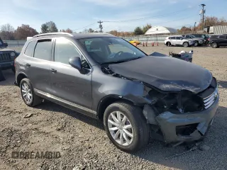 2015 Volkswagen Touareg Sport with VIN WVGEF9BP2FD002767, listed as a Copart auction lot 78127854 with Not provided miles and Salvage title. Bid and sale history available at DreamBid. Image 4.