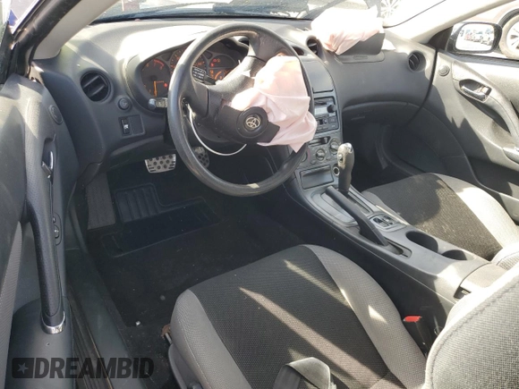 2004 Toyota Celica GT with VIN JTDDR32T140180241, listed as a Copart auction lot 77031284 with 194,669 mi miles and Clean Title. Bid and sale history available at DreamBid. Image 8.