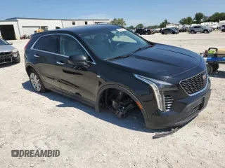 2019 Cadillac XT4 AWD Luxury with VIN 1GYFZBR45KF102731, listed as a Copart auction lot 69534914 with 76,078 mi miles and Salvage Title. Bid and sale history available at carsss.com. Image 4.