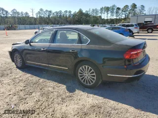 2016 Volkswagen Passat 1.8T SE with VIN 1VWBT7A38GC015188, listed as a Copart auction lot 87378074 with 210,563 mi miles and Salvage Title. Bid and sale history available at carsss.com. Image 2.