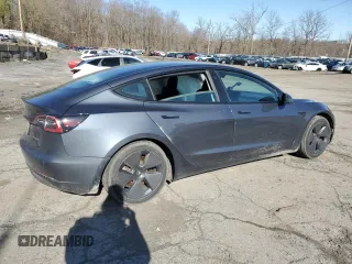 2021 Tesla Model 3 Long Range with VIN 5YJ3E1EB0MF055540, listed as a Copart auction lot 52463345 with 59,206 mi miles and Salvage Title. Bid and sale history available at DreamBid. Image 3.