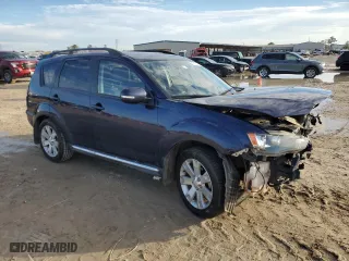 2012 Mitsubishi Outlander SE with VIN JA4AS3AW2CU017182, listed as a Copart auction lot 89184215 with 99,571 mi miles and Salvage Title. Bid and sale history available at carsss.com. Image 4.