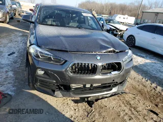 2020 BMW X2 xDrive28i with VIN WBXYJ1C00L5P51384, listed as a Copart auction lot 87406814 with 52,807 mi miles and Salvage Title. Bid and sale history available at carsss.com. Image 5.