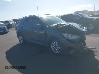 2014 Mazda CX-5 Sport with VIN JM3KE2BE4E0414721, listed as a IAAI auction lot 41408914 with Not Provided miles and . Bid and sale history available at carsss.com. Image 1.