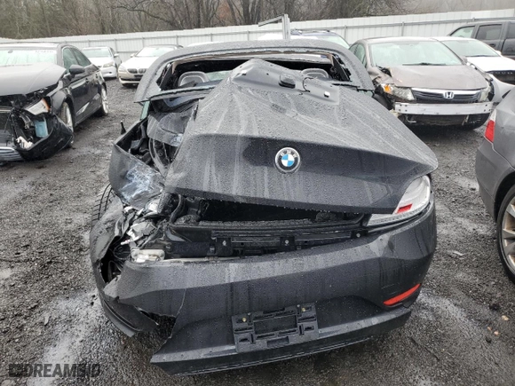 2011 BMW Z4 sDrive30i with VIN WBALM5C56BE379790, listed as a Copart auction lot 80991153 with 0 mi miles and Salvage Title. Bid and sale history available at carsss.com. Image 6.