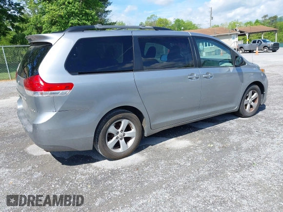 2011 Toyota Sienna LE AAS with VIN 5TDKK3DC2BS175598, listed as a IAAI auction lot 42186153 with 169,267 mi miles. Bid and sale history available at carsss.com. Image 4.