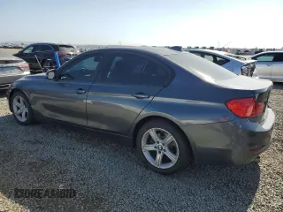 2013 BMW 3 Series 320i with VIN WBA3B1C58DK128983, listed as a Copart auction lot 61919185 with 155,698 mi miles and Clean title. Bid and sale history available at DreamBid. Image 2.