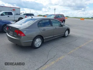 2006 Honda Civic z VIN JHMFA36246S000063, wystawiony jako IAAI lot #42374508 z przebiegiem 145 891 mil mil oraz . Historia ofert i sprzedaży dostępna na DreamBid. Obrazek 4.