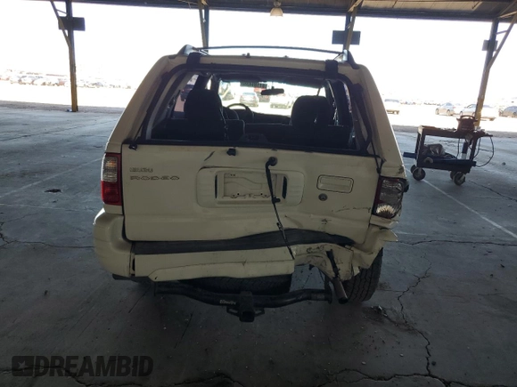 2000 Isuzu Rodeo S z VIN 4S2CK58W3Y4323965, wystawiony jako Copart lot #61189435 z przebiegiem 211 726 mil mil oraz Szkoda całkowita • Salvage title. Historia ofert i sprzedaży dostępna na DreamBid. Obrazek 6.