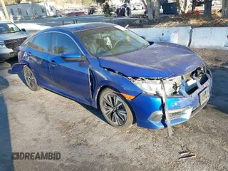 2017 Honda Civic Sedan LX with VIN 2HGFC2F52HH564693, listed as a IAAI auction lot 41378857 with 101,284 mi miles. Bid and sale history available at carsss.com. Image 1.