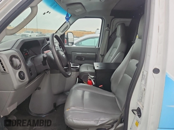 2012 Ford Econoline Cargo Commercial with VIN 1FTNE1EL2CDA18495, listed as a IAAI auction lot 42175469 with 248,092 mi miles and . Bid and sale history available at carsss.com. Image 38.