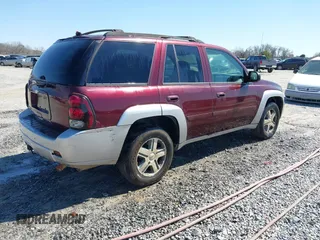 2006 Chevrolet TrailBlazer LT with VIN 1GNES13M262161488, listed as a IAAI auction lot 41774799 with 214,132 mi miles. Bid and sale history available at carsss.com. Image 4.