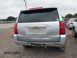 2019 Chevrolet Tahoe LT z VIN 1GNSCBKC1KR191789, wystawiony jako IAAI lot #42144961 z przebiegiem 94 178 mil mil oraz . Historia ofert i sprzedaży dostępna na DreamBid. Obrazek 16.