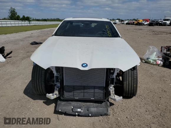 2024 BMW i5 eDrive40 with VIN WBY33FK05RCR50188, listed as a Copart auction lot 52953195 with 423 mi miles and Salvage title. Bid and sale history available at DreamBid. Image 5.