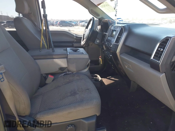 2015 Ford F-150 XLT with VIN 1FTEW1EFXFKE27190, listed as a IAAI auction lot 41670252 with 250,077 mi miles. Bid and sale history available at carsss.com. Image 5.